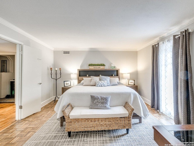 bedroom featuring a textured ceiling, light parquet floors, and ornamental molding