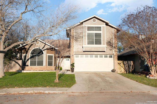 front facade featuring a front lawn and a garage