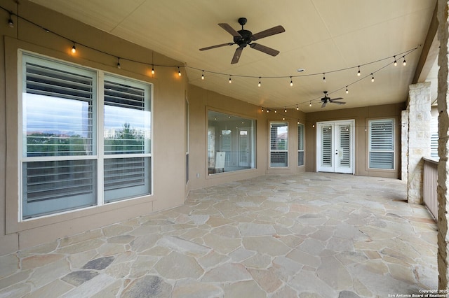 view of patio featuring ceiling fan