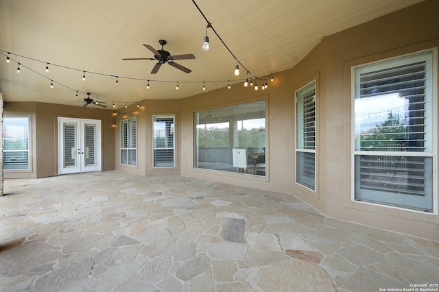 view of patio with ceiling fan and french doors