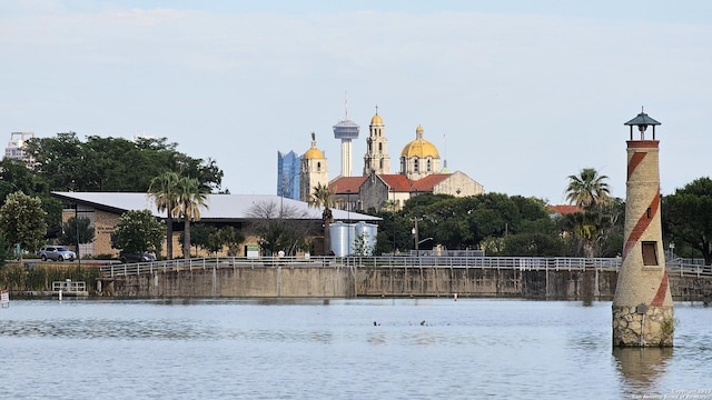 view of community with a water view