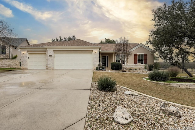 single story home with a garage