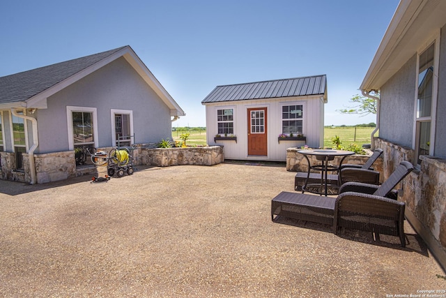 exterior space featuring an outbuilding