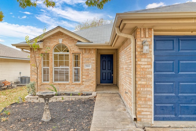 property entrance featuring central AC