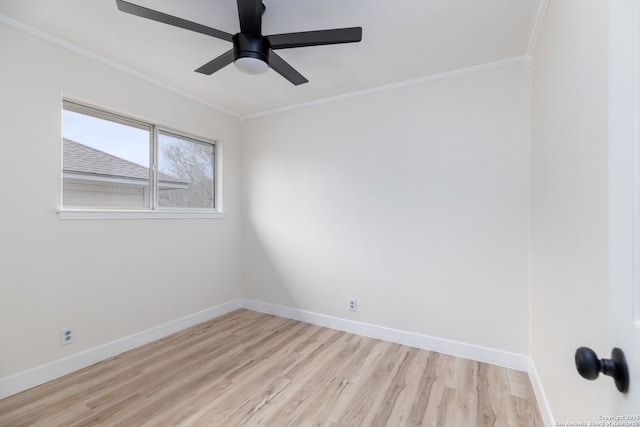 spare room featuring ceiling fan, light wood-type flooring, and ornamental molding