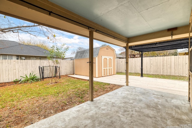 view of patio / terrace featuring a storage shed