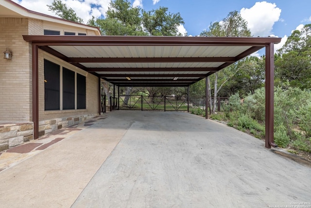 view of vehicle parking featuring a carport