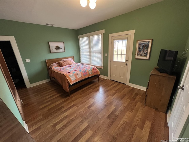 bedroom featuring wood-type flooring