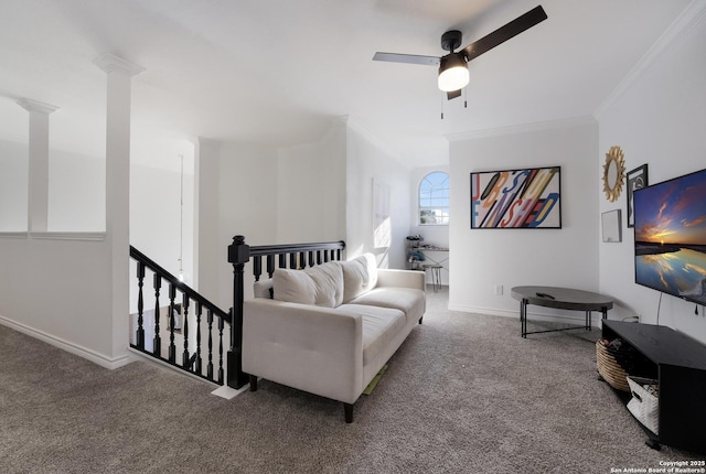 living room featuring ceiling fan, carpet, and ornamental molding