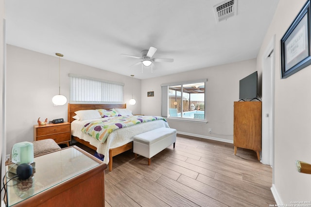 bedroom featuring ceiling fan and light wood-type flooring