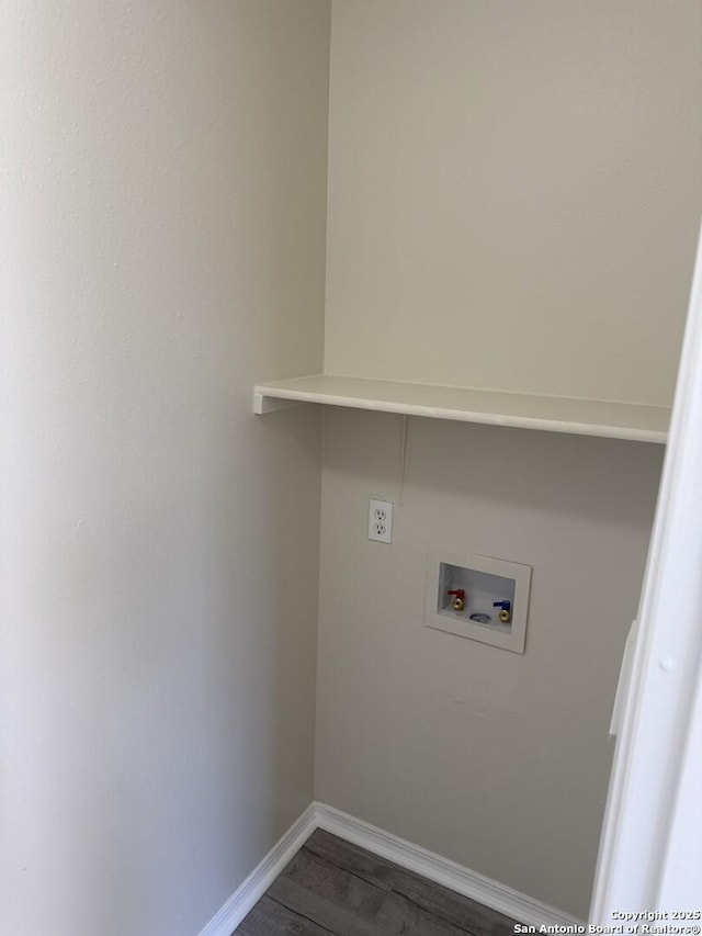 washroom featuring washer hookup and dark wood-type flooring