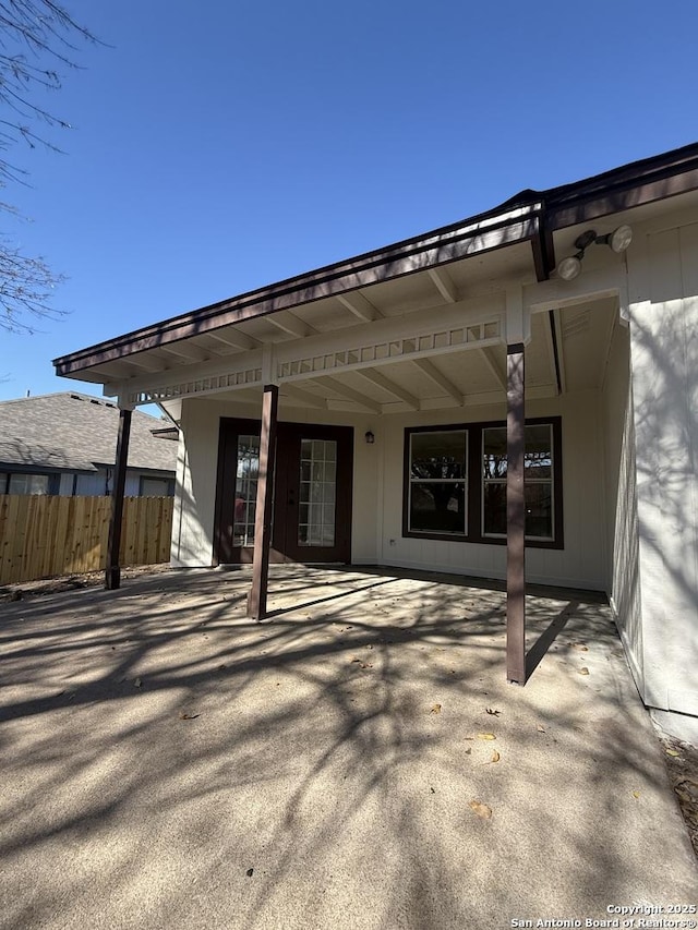 back of property with a patio area