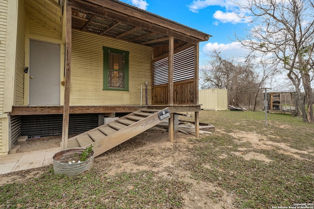 exterior space featuring a storage unit