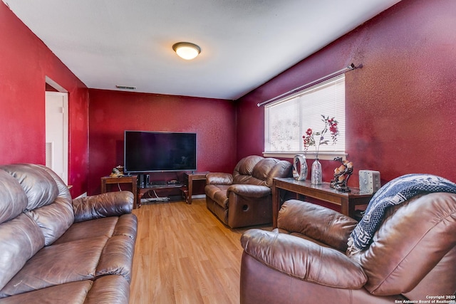 living room with light wood-type flooring