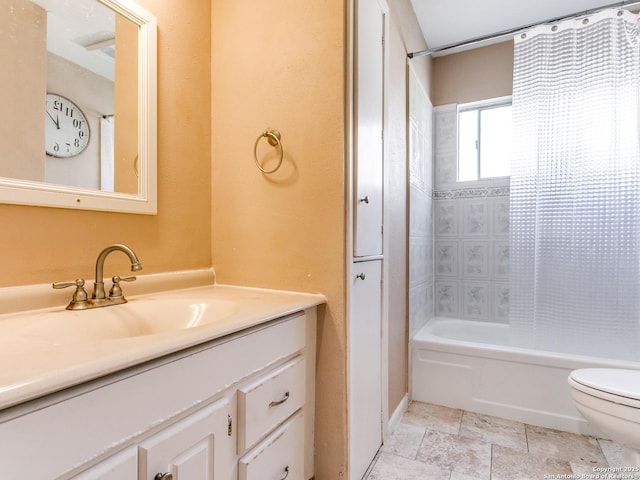 full bathroom featuring vanity, toilet, and shower / bathtub combination with curtain