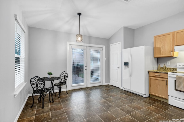 kitchen with a wealth of natural light, french doors, decorative light fixtures, and white appliances