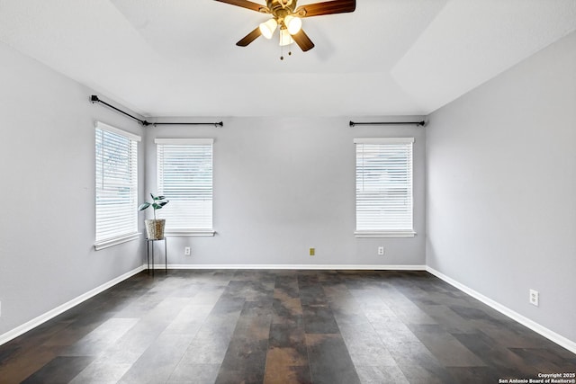 unfurnished room featuring ceiling fan and vaulted ceiling