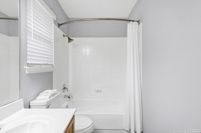 full bathroom featuring vanity, toilet, and shower / bathtub combination with curtain