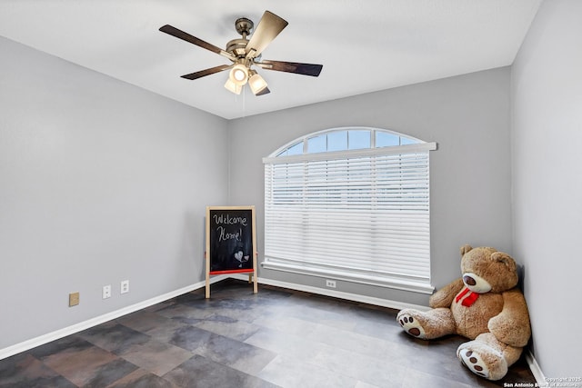 interior space featuring ceiling fan