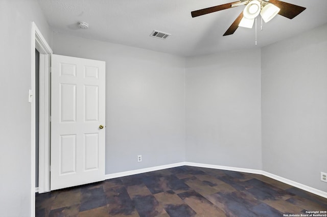 empty room with ceiling fan