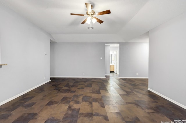 spare room featuring ceiling fan and lofted ceiling