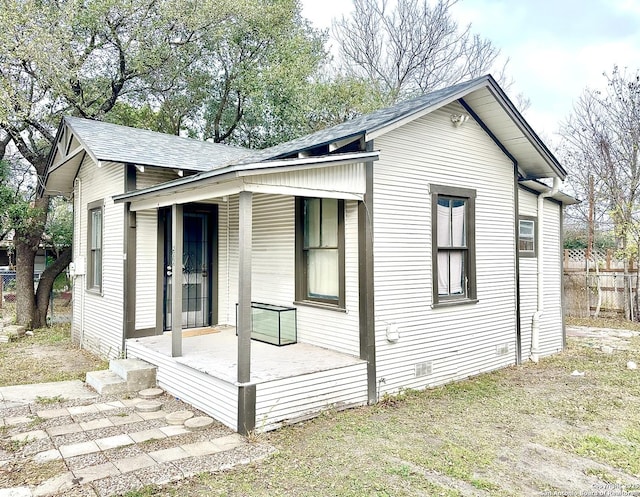 view of home's exterior with covered porch