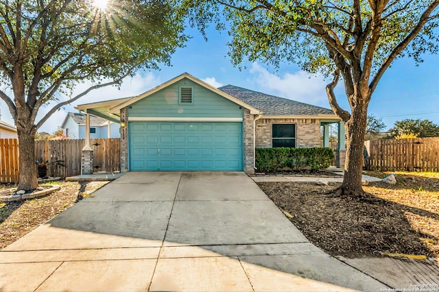 ranch-style home with a garage