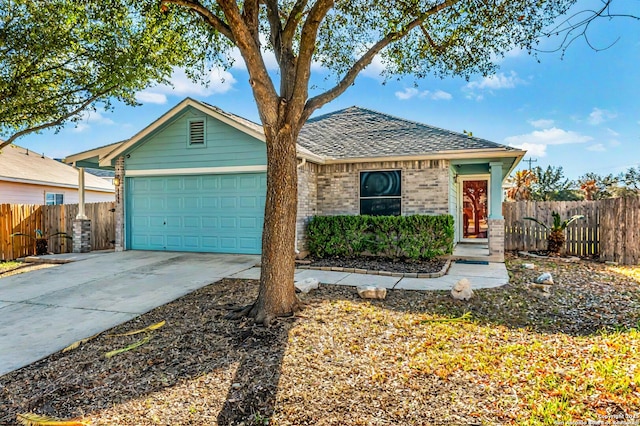 single story home with a garage