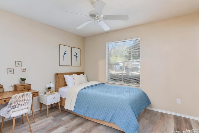 bedroom featuring ceiling fan and light wood-type flooring