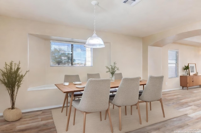 dining space featuring light hardwood / wood-style floors