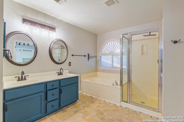 bathroom with plus walk in shower and vanity