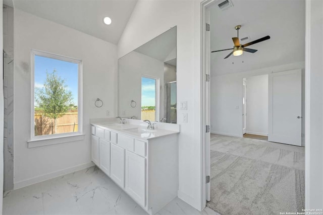 bathroom with vanity, vaulted ceiling, and ceiling fan