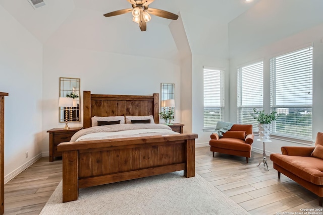 bedroom featuring high vaulted ceiling and ceiling fan