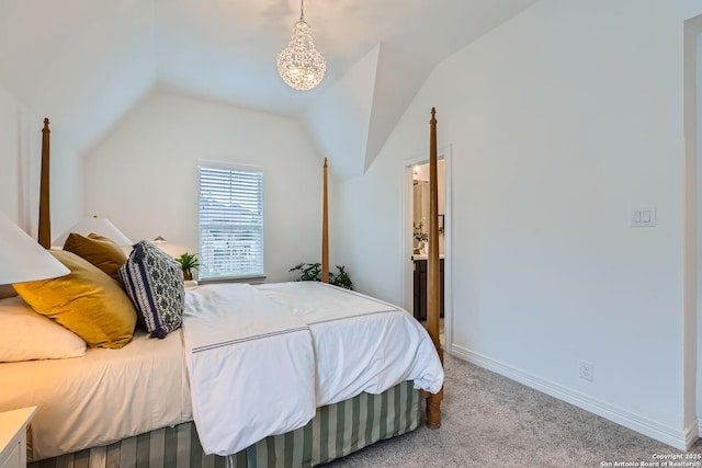 bedroom with lofted ceiling and light carpet