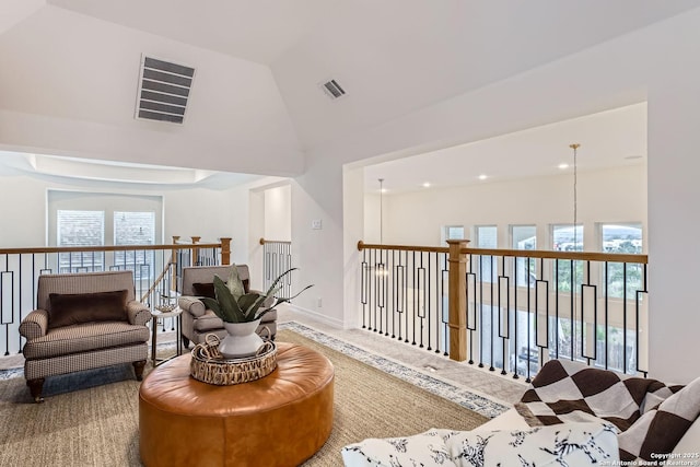 interior space featuring a wealth of natural light and vaulted ceiling