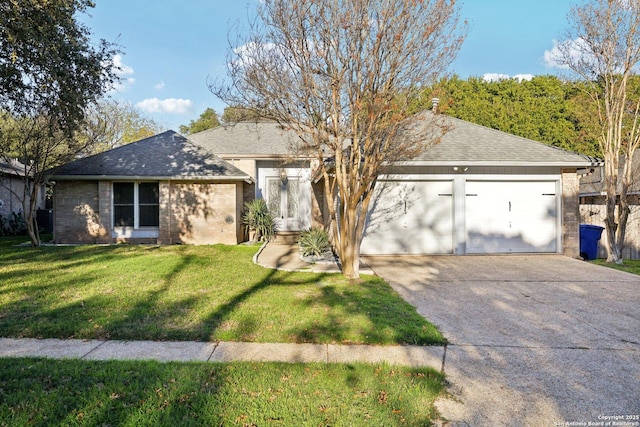 ranch-style home featuring a front lawn and a garage