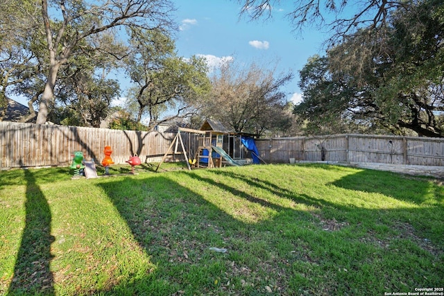 view of yard with a playground