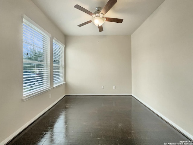 empty room featuring ceiling fan