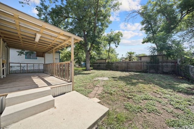 view of yard with a deck