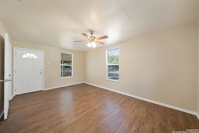 foyer featuring ceiling fan and dark hardwood / wood-style flooring