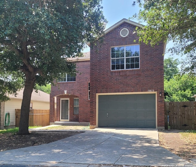 front of property with a garage