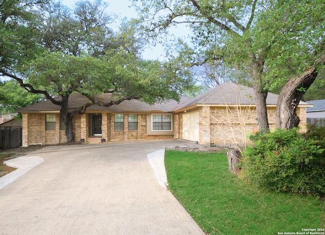 ranch-style home with a garage