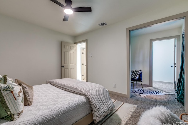 bedroom with ceiling fan and carpet