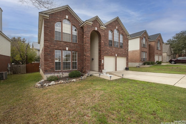 front of property with a garage and a front yard