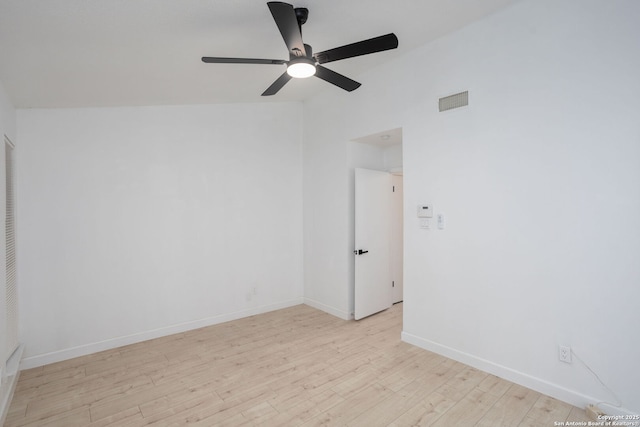 empty room with ceiling fan and light wood-type flooring