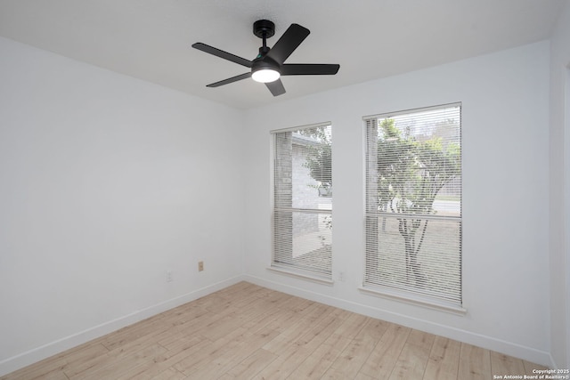 unfurnished room featuring light wood-type flooring and ceiling fan