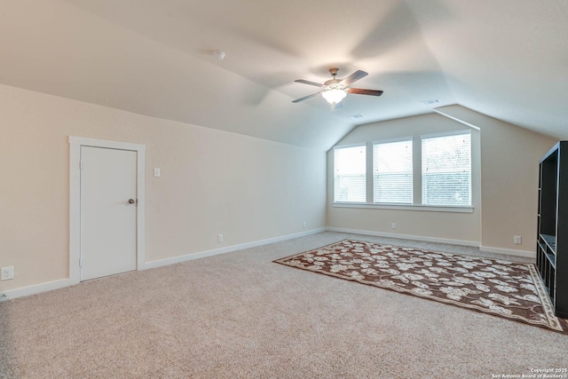 bonus room with carpet flooring, ceiling fan, and lofted ceiling