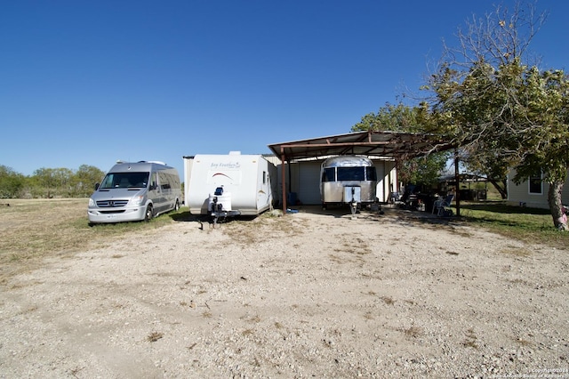 view of front of property with a carport