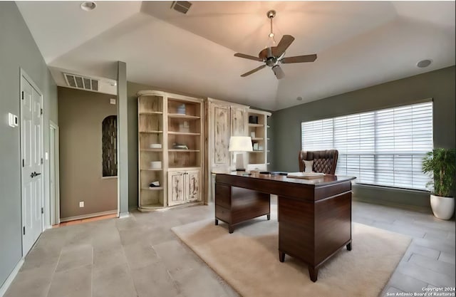 office with ceiling fan and vaulted ceiling