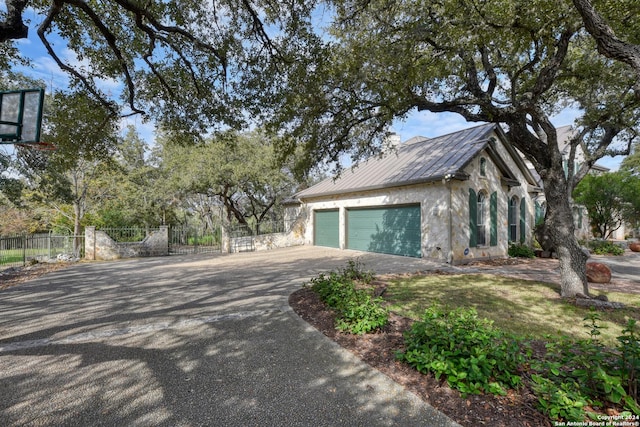 view of side of home with a garage